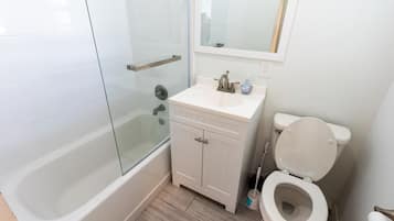 Hair dryer, towels, soap, shampoo