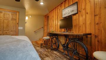 1 bedroom, desk, iron/ironing board, travel crib