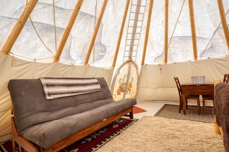 Living area. Buffalo Glamping Tipi with King Bed in Black Hills