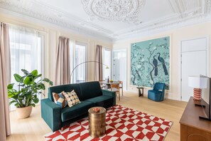 One Bedroom Apartment with Terrace | Living area | 45-inch Smart TV with digital channels