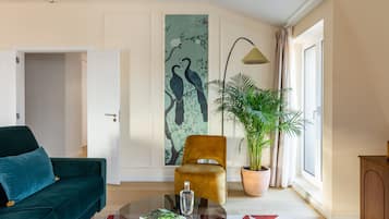 Three-Bedroom Penthouse Apartment | Living area | 45-inch Smart TV with digital channels