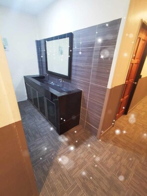 Shower, rainfall showerhead, free toiletries, hair dryer - Marvel Suite ABNB (Port Dickson)