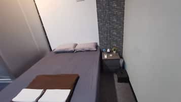Economy Room, 1 Double Bed | Iron/ironing board, free WiFi