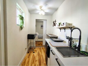 Fridge, microwave, stovetop, coffee/tea maker