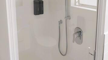 Two Bedroom Unit | Bathroom | Shower, free toiletries, hair dryer, towels