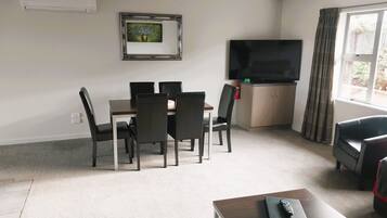 Two Bedroom Unit | Living area | 32-inch LCD TV with satellite channels