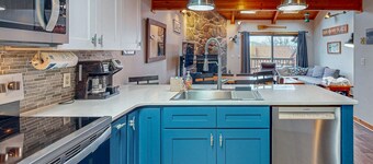 Tranquil & sunlit lake retreat with pool, fire pit, & views - near skiing & golf
