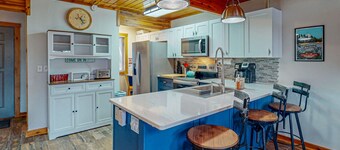 Tranquil & sunlit lake retreat with pool, fire pit, & views - near skiing & golf