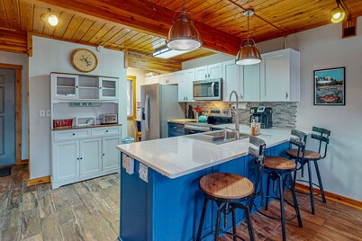 Tranquil & sunlit lake retreat with pool, fire pit, & views - near skiing & golf
