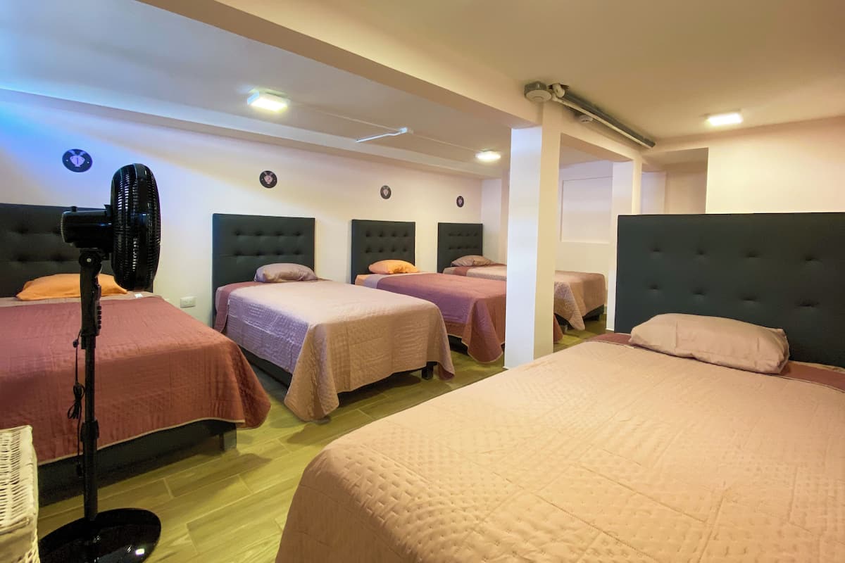 Memory-foam beds, desk, laptop workspace, blackout curtains