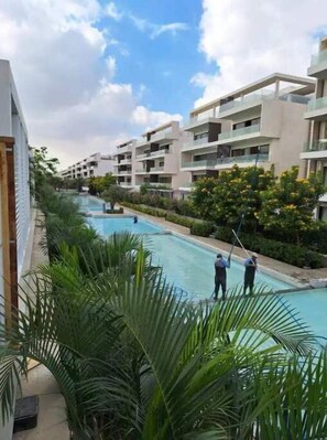 Pool - LakeView 2 bedrooms with Garden Apartment Near AUC (New Cairo City)