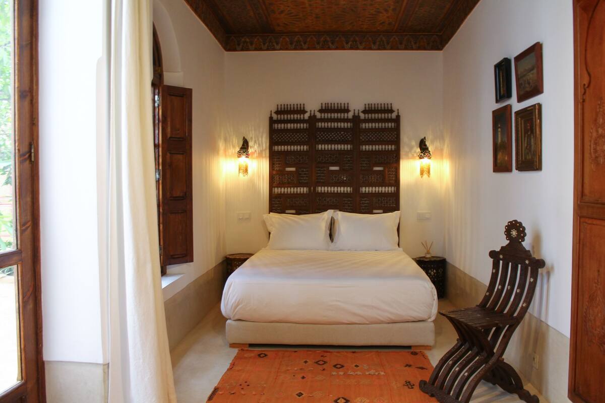 Deluxe Double Room, Courtyard Area | Pillowtop beds, laptop workspace, WiFi (free), individually decorated