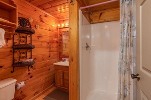 Shower, jetted tub, towels