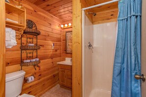 Shower, jetted tub, towels
