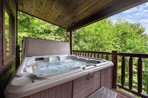 A wooden deck with a hot tub. - Nothing Sweeter Than Views Like These (SEVIERVILLE)