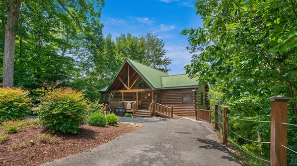 Escape to a serene natural haven surrounded by lush greenery and a tranquil atmosphere.