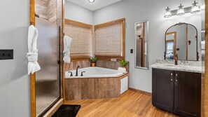 Shower, jetted tub, towels