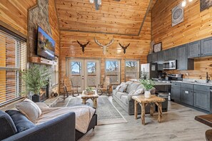 Smart TV, fireplace - Experience Exclusivity: Unwind at Moonrise Pool Lodge Luxury Cabin (SEVIERVILLE)