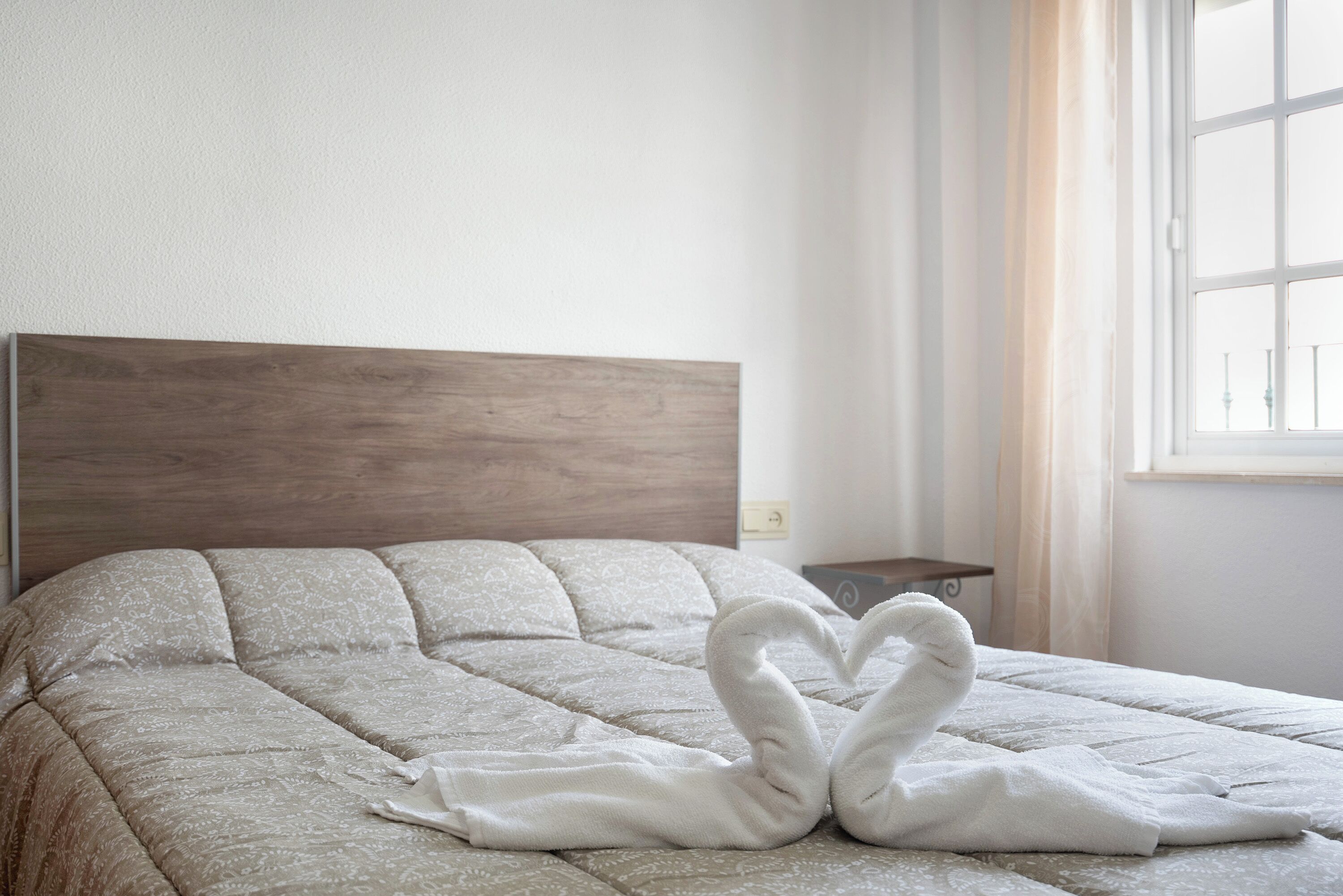 2 slaapkamers, een strijkplank/strijkijzer, beddengoed