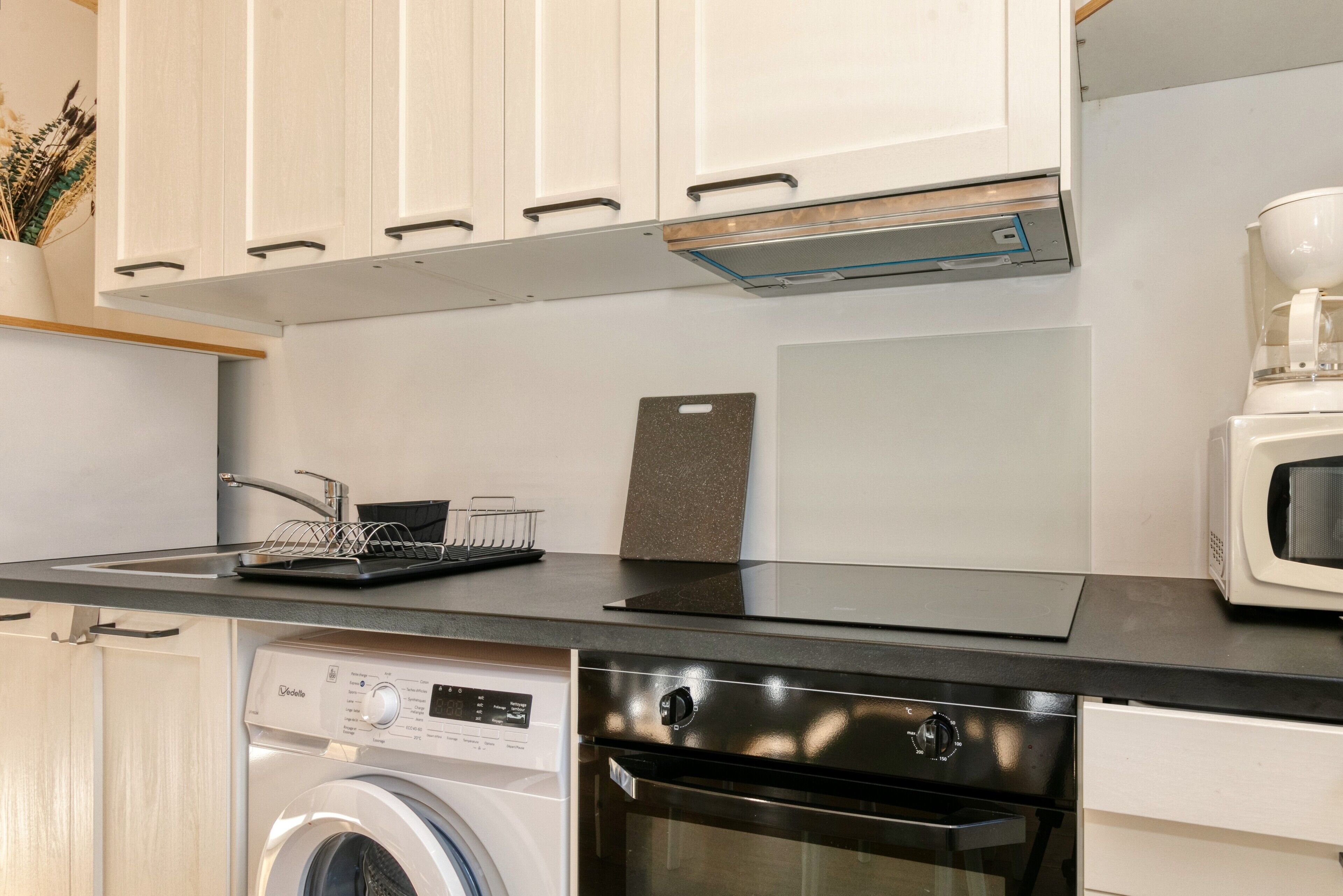 Fridge, microwave, stovetop, coffee/tea maker