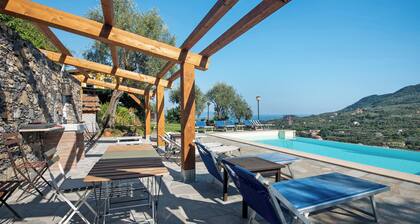 Maison de vacances 'GinelĂ ' avec vue sur la mer, Wi-Fi et climatisation