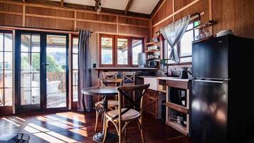 Fridge, microwave, stovetop, coffee/tea maker