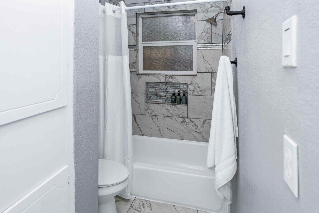Hair dryer, towels, soap, shampoo