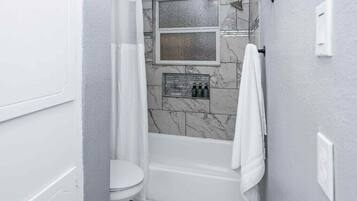 Hair dryer, towels, soap, shampoo