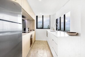 Fridge, microwave, oven, stovetop - Breeze - Luxury Mooloolaba Apt with Ocean Views! (Mooloolaba)