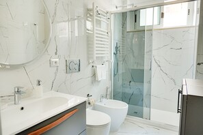 Hair dryer, towels, soap, toilet paper