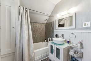 Hair dryer, towels, soap, shampoo