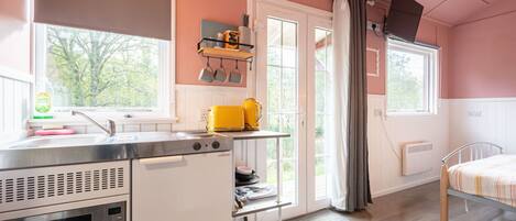 Fridge, microwave, cookware/dishes/utensils