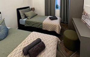 4 camere, culla da viaggio, Wi-Fi gratuito, lenzuola