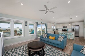 TV, fireplace - Ocean Breeze: Dog-Friendly w/Views, Elevator, Private Pool, Large fenced in Yard (Kitty Hawk)