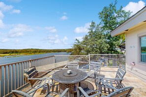 Outdoor dining - Stunning lakefront home with balcony, AC, W/D, & incredible views (Spicewood)