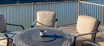 Stunning lakefront home with balcony, AC, W/D, & incredible views