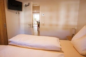 1 quarto, Wi-Fi de cortesia, roupa de cama