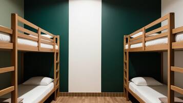 Economy Shared Dormitory, Mixed Dorm, Shared Bathroom | Premium bedding, individually decorated, desk, laptop workspace