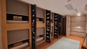 A modern storage unit with multiple compartments, each labeled with numbers. - Moonstar Cebu Hotel (Cebu City)