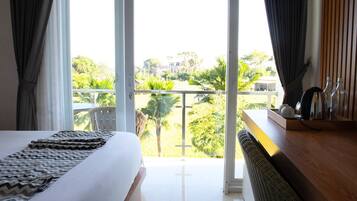 Habitación doble Deluxe, 1 cama King size, Terraza, vista al jardín | 1 habitación, sábanas de algodón egipcio y ropa de cama de alta calidad