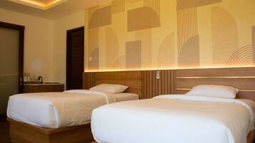 Kamar Double Eksekutif, 1 Tempat Tidur King, pemandangan kebun | Seprai katun Mesir, seprai premium, minibar, dan brankas