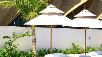 2 outdoor pools, pool umbrellas, sun loungers