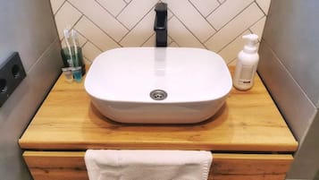 Hair dryer, towels, soap, shampoo