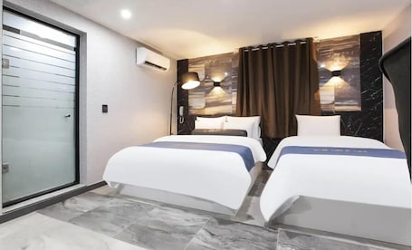 Business Twin Room | Hypo-allergenic bedding, down comforters, individually decorated