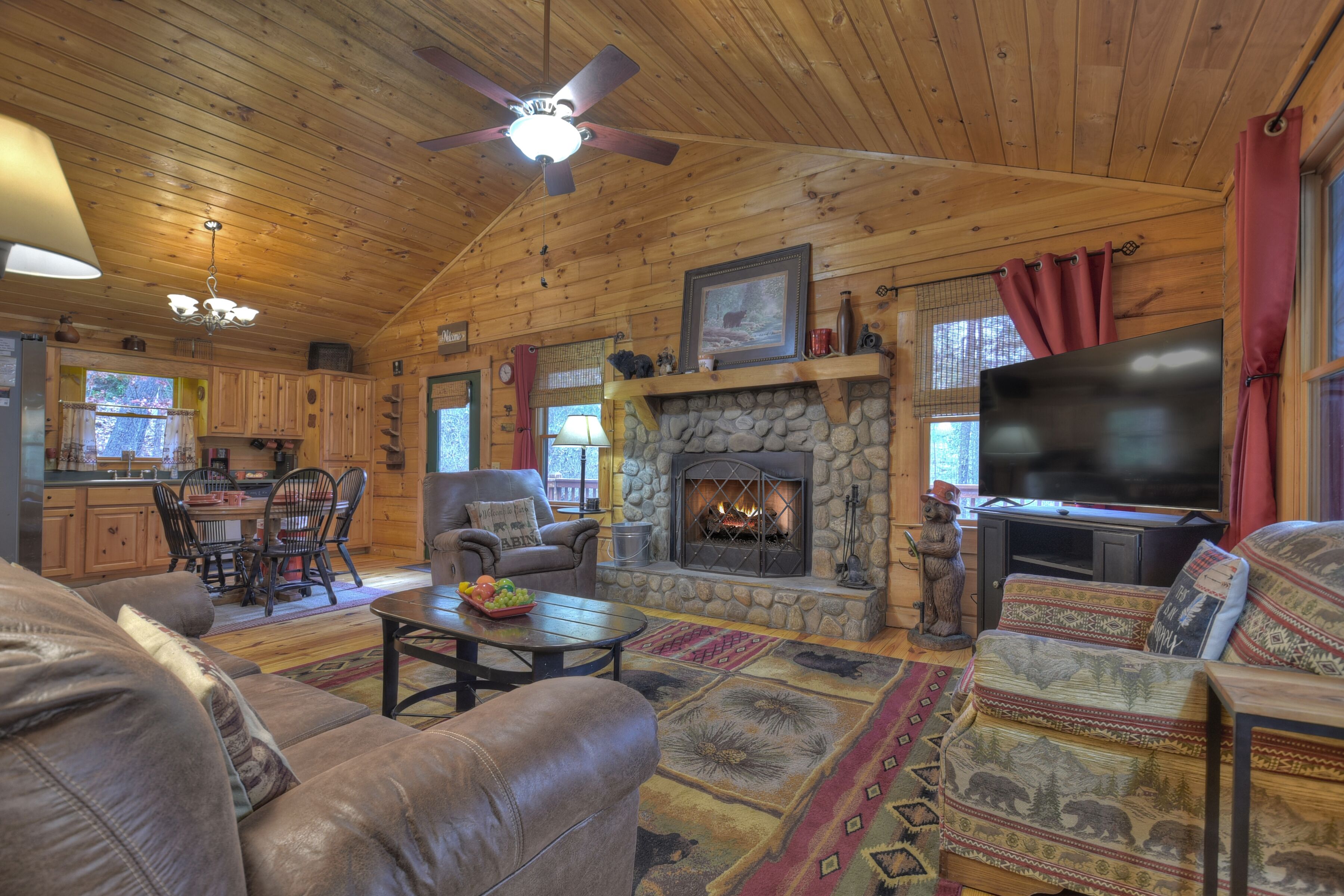 Papa Bear Path is a lovely pet friendly cabin rental in Blue Ridge with a hot tub, firepit and hiking nearby