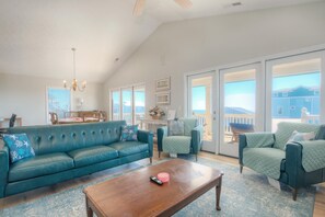 Smart TV, DVD player, books, video library - Coral House: Spacious oceanview retreat in Oak Island, NC, perfect for families. (Oak Island)