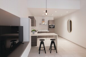 Premium Apartment, 1 Bedroom, Non Smoking, City View | Living area | 42-inch Smart TV with digital channels, streaming services