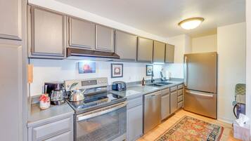 Apartment (1 Bedroom) | Private kitchen | Microwave, oven, stovetop, dishwasher