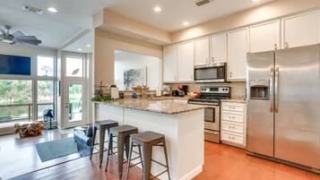 Apartment (4 Bedrooms) | Private kitchen | Highchair, paper towels