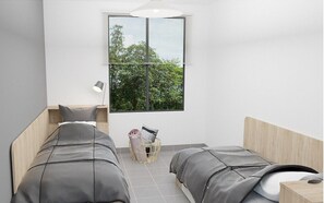 Blackout drapes, soundproofing, free WiFi, bed sheets
